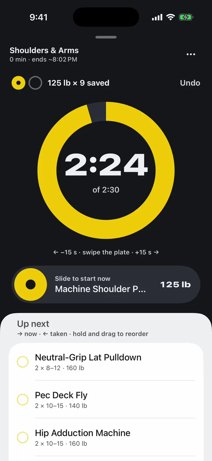 The rest ring empties to 0:00 and the next set of the machine shoulder press comes up with its weight